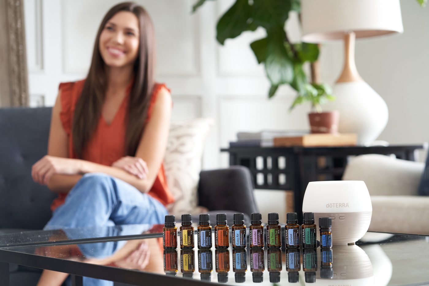 The Home Essentials kit: ten dōTERRA oils and a diffuser on a kitchen counter
